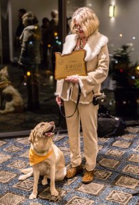 Joey the Labrador Retriever and owner Ava Chapman posing with the 2019 Joriad 1st place award